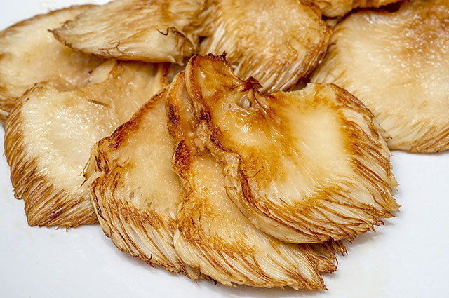 Fresh Lion’s Mane mushroom being prepared in a plant-based kitchen